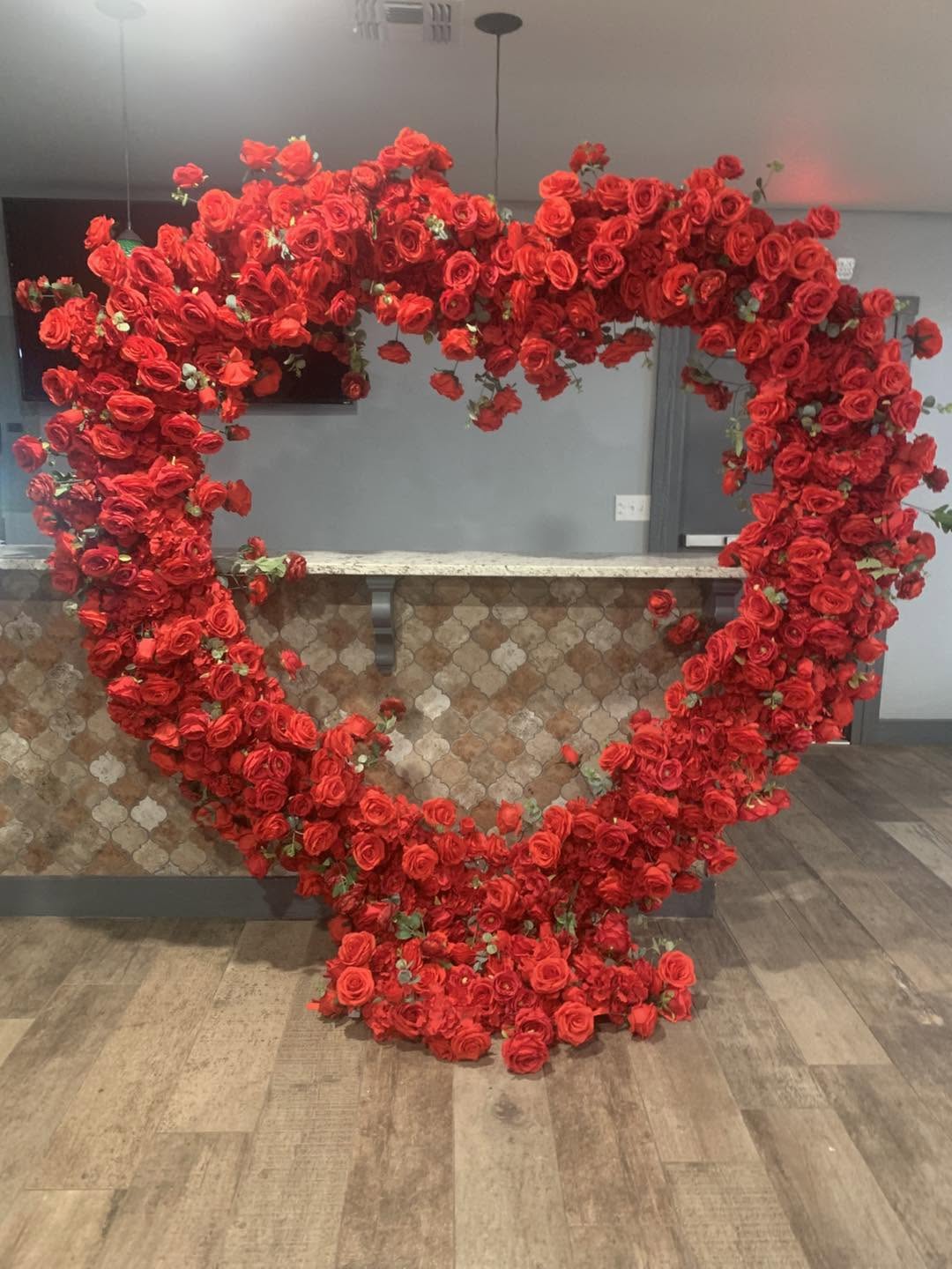 Rose heart backdrop at Carabajal Event Center